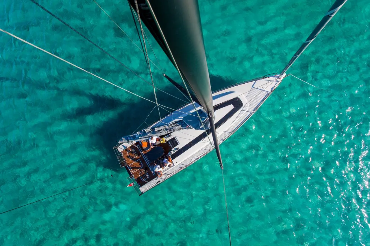 Looking down the mast of a yacht in clear water. Photograph by Martin-Sebastian Kreplin